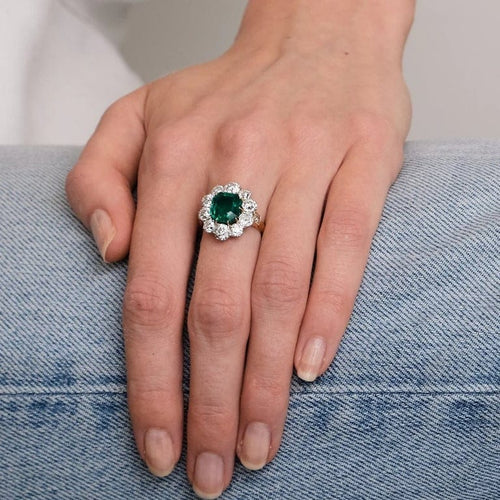 Bague 51 Bague marguerite en or jaune avec émeraude et diamants 58 Facettes