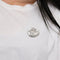 Broche Broche cygne en or gris et nacre, diamants 58 Facettes