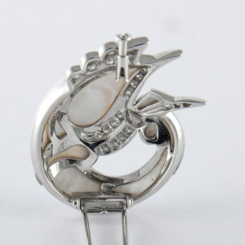 Broche Broche cygne en or gris et nacre, diamants 58 Facettes