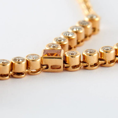 Collier Collier en or jaune avec grenats mandarine et diamants 58 Facettes
