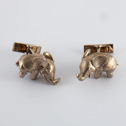 Boutons de manchette Boutons de manchette éléphant en or gris 18k et diamants 58 Facettes 2.566