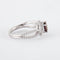 Bague 52 Tentation - Bague en or gris 18K avec saphir rose et diamants 58 Facettes 2.1122