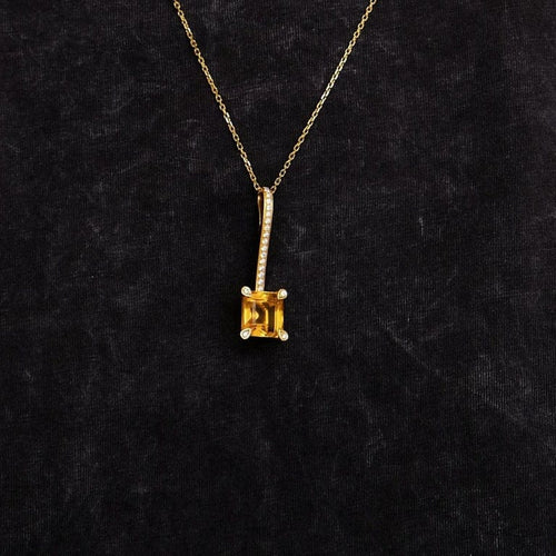 Pendentif Pendentif en or jaune 18k avec citrine et diamants 58 Facettes 2.159