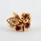 Boucles d'oreilles Boucles d’oreilles fleurs à clip en or jaune 18k, rubis birmans et diamants 58 Facettes 2.165
