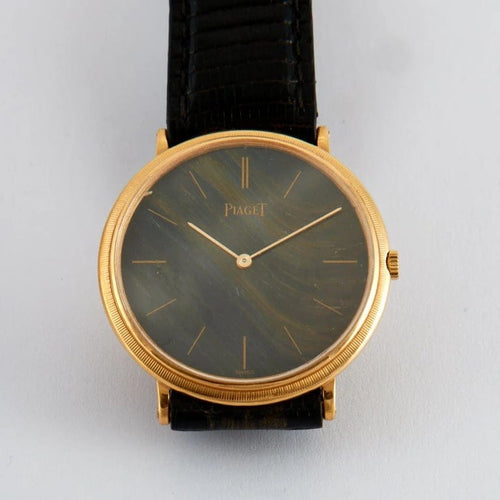 Montre Piaget - Montre en or jaune 18k, cadran œil-de-tigre 31 mm 58 Facettes 2.1384