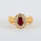 Bague 52.5 Bague marguerite en or jaune 18k avec rubis birman et diamants 58 Facettes 2.197