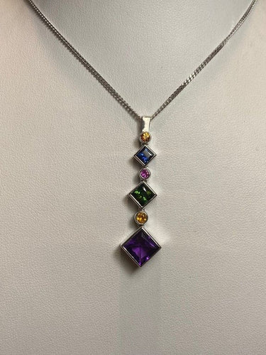 Pendentif Pendentif Arlequin en or blanc 18k améthyste, rubis et diamants 58 Facettes 002.151
