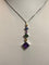 Pendentif Pendentif Arlequin en or blanc 18k améthyste, rubis et diamants 58 Facettes 002.151