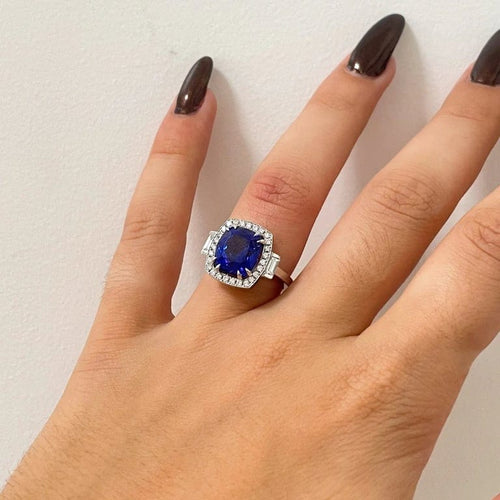 Bague 54 Bague entourage en or blanc 18 k à tanzanite et diamants 58 Facettes