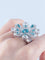 Bague 53 Bague fleur en or blanc 18 carats avec diamants et topazes 58 Facettes