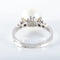 Bague 52 Bague en or gris 18K avec perle blanche et diamants 58 Facettes LP 918