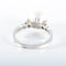 Bague 52 Bague en or gris 18K avec perle blanche et diamants 58 Facettes LP 918