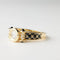 Bague 54 Korloff - Bague en or jaune 18k avec diamants et émail noir 58 Facettes
