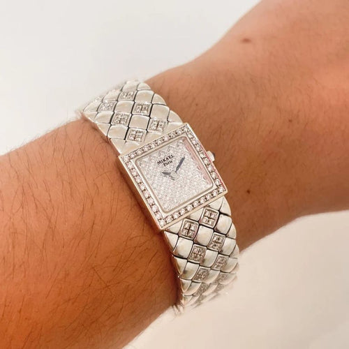 Montre MIKAEL - Montre en or blanc 18 k sertie de diamants 58 Facettes M8236