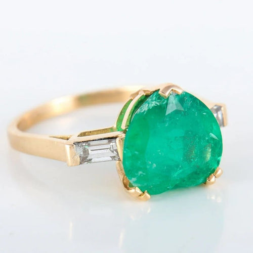 Bague 51 Bague cœur en or jaune 750 avec émeraude et diamants 58 Facettes 8392