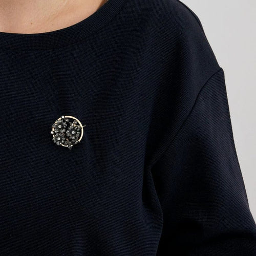 Broche Broche ronde en or et platine avec diamants taille rose 58 Facettes