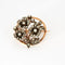Broche Broche ronde en or et platine avec diamants taille rose 58 Facettes