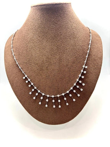Collier Collier draperie en or blanc 18k et diamants 58 Facettes M9012