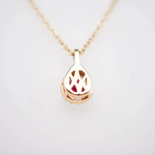 Collier Pendentif sur chaîne en or jaune 18 carats rubis et diamants 58 Facettes 351135