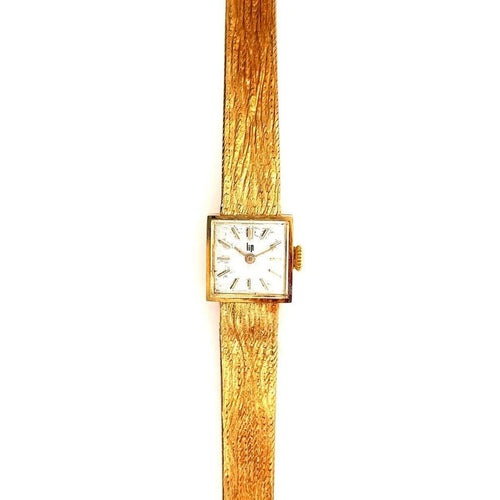Montre Lip - Montre femme vintage en or jaune 58 Facettes