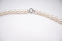 Collier Collier de perles d’eau douce en or blanc 18 carats 58 Facettes 35577