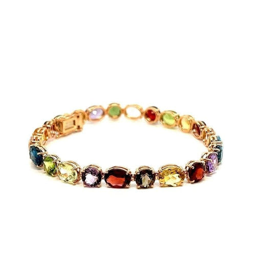 Bracelet Bracelet articulé en or jaune 18 carats et pierres multicolores 58 Facettes