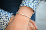 Bracelet Bracelet tennis en or blanc 18 carats avec diamants poire et brillants 58 Facettes