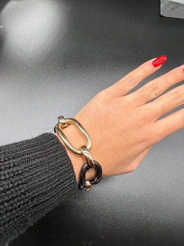 Bracelet Bracelet articulé en or rose 18 carats et ébène 58 Facettes