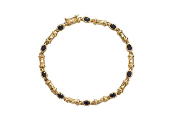 Bracelet Bracelet en or 18 carats avec diamants et saphirs 58 Facettes