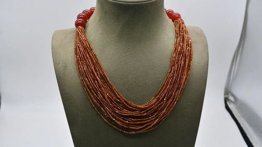Collier Collier en agate rouge, hessonite et bakélite 58 Facettes