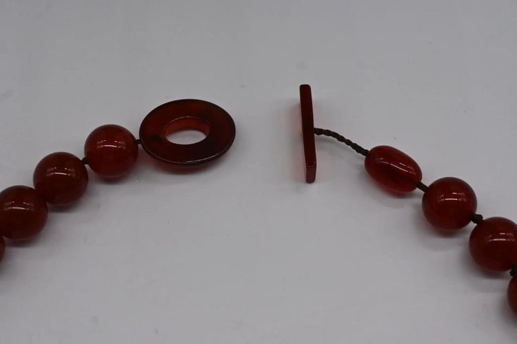 Collier Collier en agate rouge, hessonite et bakélite 58 Facettes
