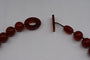 Collier Collier en agate rouge, hessonite et bakélite 58 Facettes
