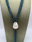 Collier Collier sautoir à franges en topazes London blue, perle baroque et bakélite 58 Facettes