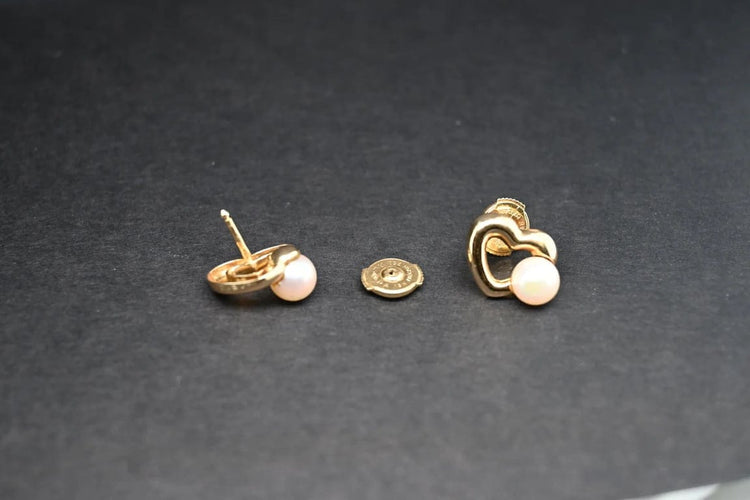 Boucles d'oreilles Cartier - Boucles d’oreilles cœur en or jaune 18 carats et perles blanches 58 Facettes