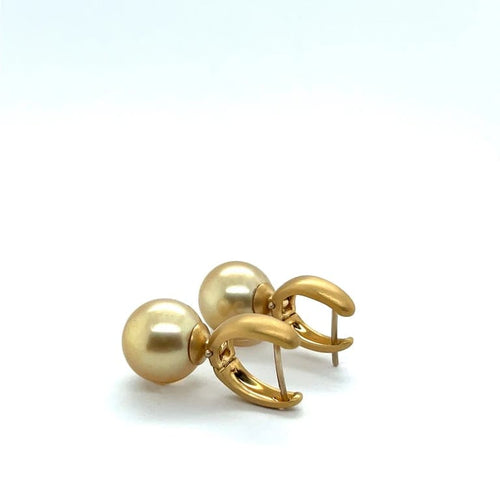 Boucles d'oreilles Boucles d’oreilles pendantes en or jaune 18 carats et perles champagne 58 Facettes 380872/Z05HU0U1