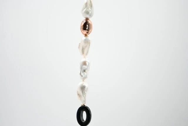 Bracelet Bracelet de perles baroques avec fermoir en or rose 18 carats 58 Facettes 341953/A0E8D2