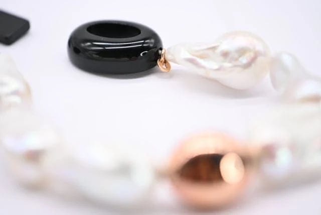 Bracelet Bracelet de perles baroques avec fermoir en or rose 18 carats 58 Facettes 341953/A0E8D2