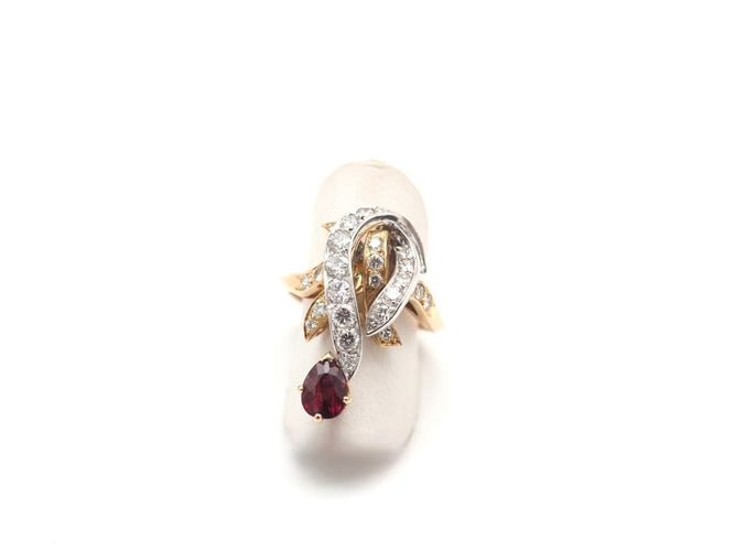Bague 54 Bague en or jaune 750 avec rubis taille poire et diamants 58 Facettes