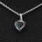 Pendentif Pendentif en or blanc 750 avec topaze cœur et diamants 58 Facettes