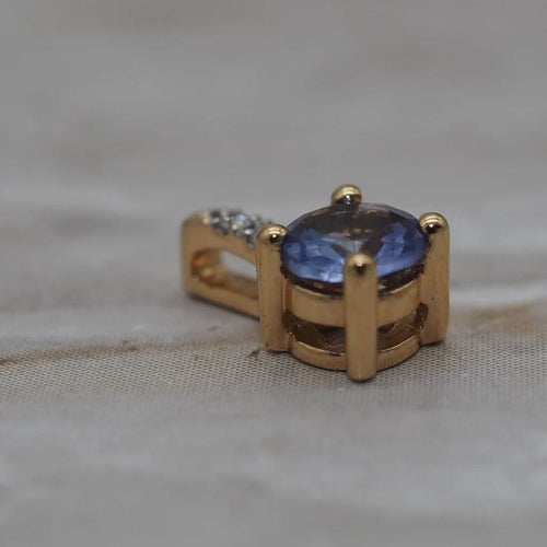 Pendentif Pendentif en or jaune 750‰ avec tanzanite 0,25 ct 58 Facettes