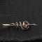 Broche Broche serpent en or jaune 750, rubis et diamants 58 Facettes