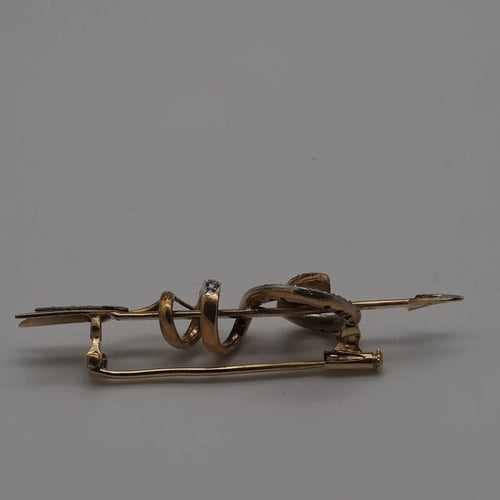 Broche Broche serpent en or jaune 750, rubis et diamants 58 Facettes