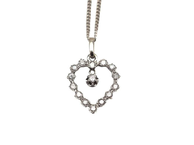 Collier Collier - Pendentif cœur en or blanc 750 et diamants 58 Facettes