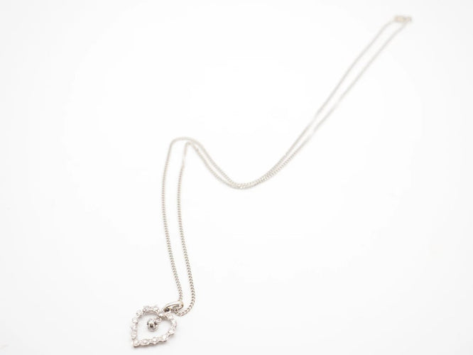Collier Collier - Pendentif cœur en or blanc 750 et diamants 58 Facettes