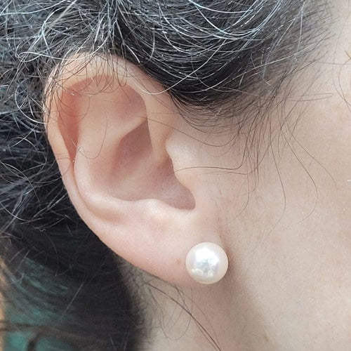 Boucles d'oreilles Boucles d'oreilles en perles avec étoile en diamants en or blanc et jaune 18 carats 58 Facettes PE238TA159