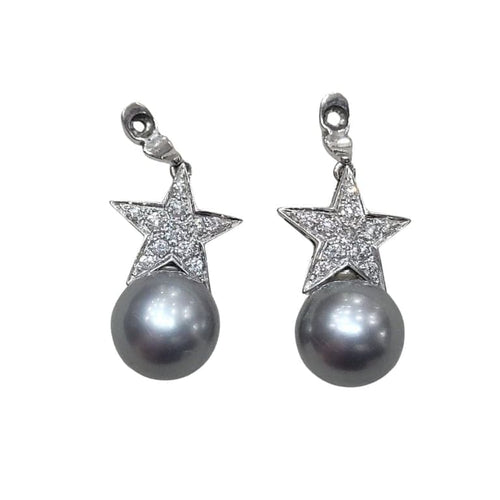 Boucles d'oreilles Boucles d'oreilles en perles avec étoile en diamants en or blanc et jaune 18 carats 58 Facettes PE238TA159