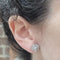 Boucles d'oreilles Boucles d’oreilles fleur en or blanc 18 carats et diamants 58 Facettes PE413
