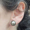 Boucles d'oreilles Boucles d’oreilles en perles de Tahiti en or blanc 18 carats 58 Facettes PE594