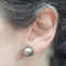 Boucles d'oreilles Boucles d’oreilles en perles de Tahiti en or blanc 18 carats 58 Facettes PE594