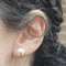 Boucles d'oreilles Boucles d’oreilles en or 18 carats et perles d’eau douce roses 58 Facettes TA128